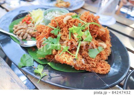 crispy fish salad ,crisp fish or crispy catfish salad or crisp catfish salad 84247432