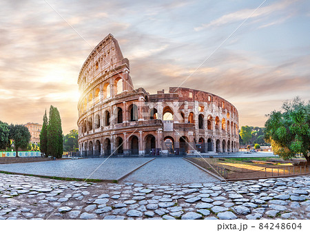 Coliseum in Rome at sunset, the main summer view, Rome, Italy Coliseum in Rome at sunset, the main summer view, Rome, Italy 84248604