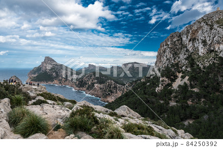 Panoramic view over the sea, cliffs, rocks and mountains of Cap de Fromentor, Mallorca, Spain 84250392