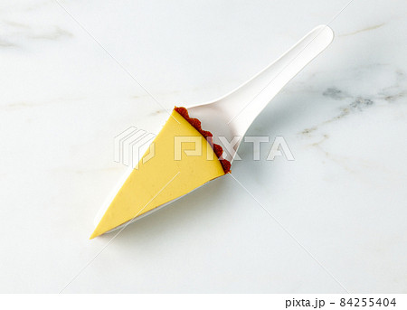 slice of fresh vegan mango cake slice of fresh vegan mango cake 84255404