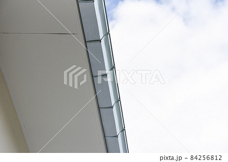 Rain gutter, Stainless steel aluzinc rain gutter on the roof house with sky background 84256812