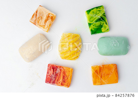Colorful handmade soap bars on a white background Colorful handmade soap bars on a white background 84257876