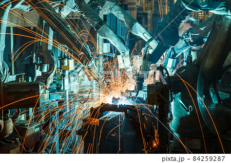 Welding robots movement in a car factory 84259287