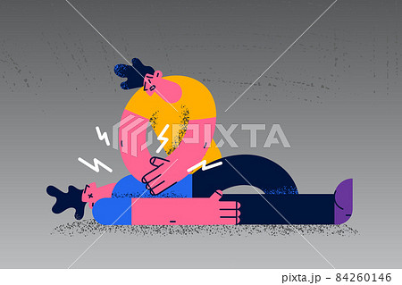 Man make heart massage to victim on floor Man make heart massage to victim on floor 84260146