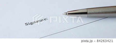 Document and pen for signing are on table Document and pen for signing are on table 84263421