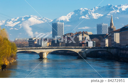 Cityscape of Grenoble with cable car and snowy Alps Cityscape of Grenoble with cable car and snowy Alps 84272951