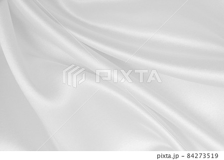 Smooth elegant white silk or satin luxury cloth texture as wedding background. Luxurious background design 84273519