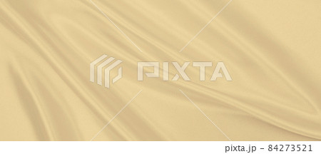 Smooth elegant golden silk or satin luxury cloth texture as wedding background. Luxurious background design. In Sepia toned. Retro style 84273521