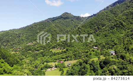 Flying over beautiful green mountains landscape, aerial shot, top view, wonderful world, scenic travel georgia Flying over beautiful green mountains landscape, aerial shot, top view, wonderful world, scenic travel georgia 84273614