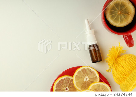 Flu treatment accessories on white table, space for text Flu treatment accessories on white table, space for text 84274244