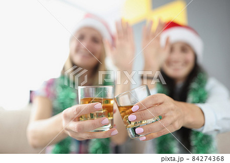 Best friends do clink with glasses filled with champagne Best friends do clink with glasses filled with champagne 84274368