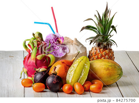 Tropical fruits on wooden table top view 84275700