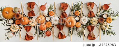 Ceramic plates, tableware and golden culery over 84276983