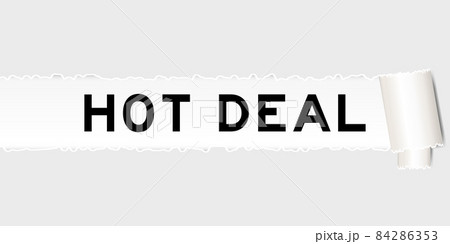 Ripped gray paper background that have word hot deal under torn part 84286353