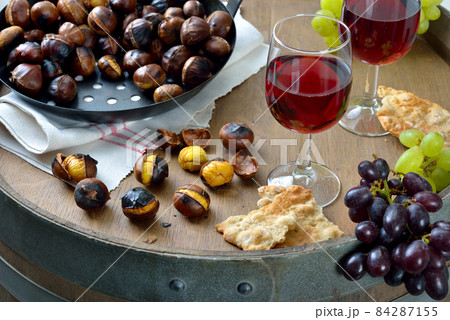 Wine tasting in South Tyrol with roasted chestnuts and the local crunchy rye bread 84287155