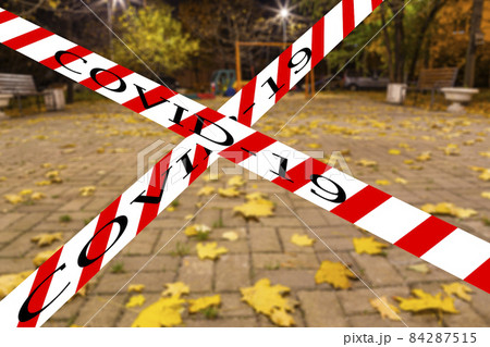 Coronavirus in Moscow, Russia. An empty playground on an autumn night in one of the residential areas (blurry view). Covid-19 sign. Concept of COVID pandemic and travel. Coronavirus in Moscow, Russia. An empty playground on an autumn night in one of the residential areas (blurry view). Covid-19 sign. Concept of COVID pandemic and travel. 84287515