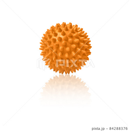 Orange plastic spiny massage ball isolated on white. Concept of physiotherapy or fitness. Closeup of a colorful rubber ball for dog teeth on a white color background. Corona virus model. Orange plastic spiny massage ball isolated on white. Concept of physiotherapy or fitness. Closeup of a colorful rubber ball for dog teeth on a white color background. Corona virus model. 84288376