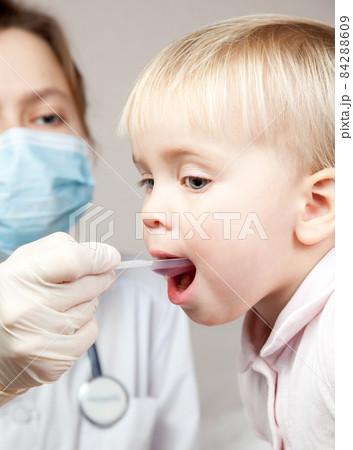 Child taking a medicine Child taking a medicine 84288609