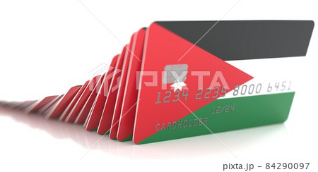 Domino effect with falling credit cards with flags of Jordan. Conceptual 3d rendering 84290097