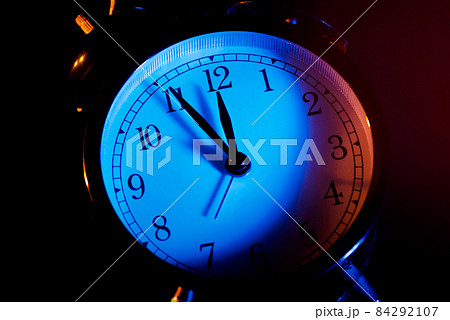 Five minutes to midnight on retro analog clock 84292107