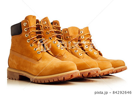 yellow boots isolated on white yellow boots isolated on white 84292646