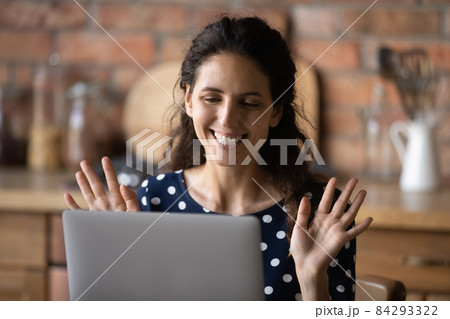 Pleasant young latina female give online lesson consultation using laptop 84293322