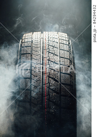 winter tire in smoke winter tire in smoke 84294432