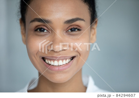 Close up portrait of african woman with perfect skin. Close up portrait of african woman with perfect skin. 84294607