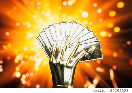 poker cards trophy against shiny sparks background poker cards trophy against shiny sparks background 84295523
