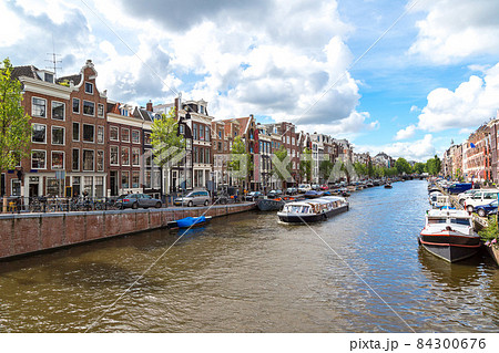 Amsterdam canals and  boats, Holland, Netherlands. 84300676