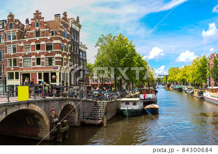 Amsterdam canals and  boats, Holland, Netherlands. 84300684