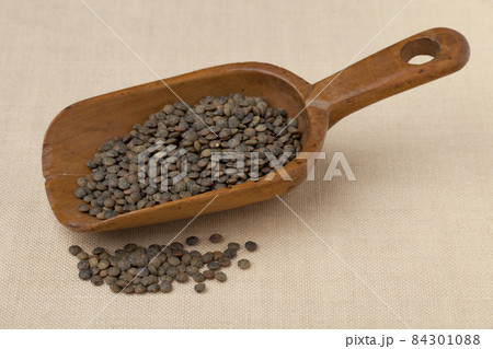 rustic scoop of French green lentils rustic scoop of French green lentils 84301088