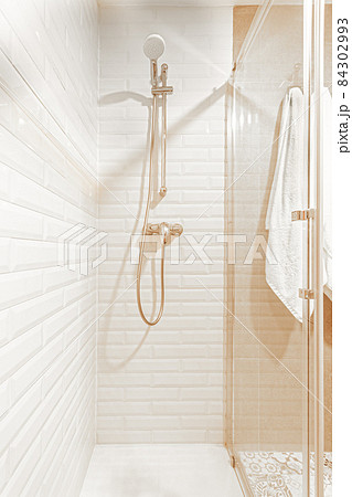Image of shower zone in a white, beige hotel bathroom 84302993