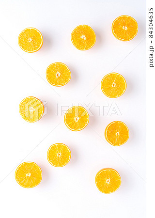 Fresh oranges isolated on white background Fresh oranges isolated on white background 84304635