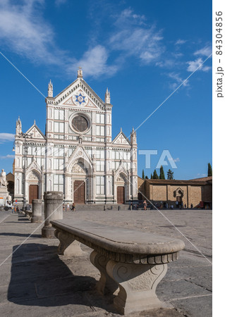 Bench on square in front of cathedral Santa Croce in Florence Italy 84304856