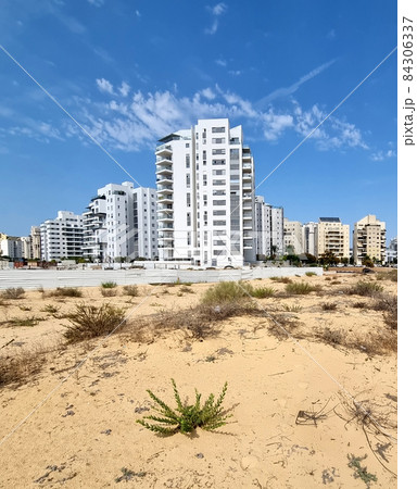 City construction among desert dunes.  84306337