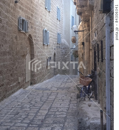 An old narrow street in old Jaffa paved with paving stones 84306341