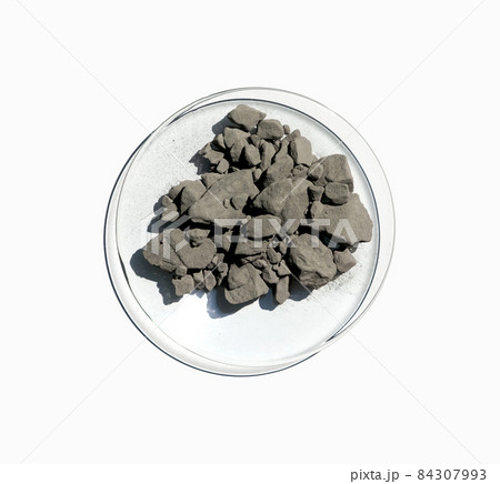 Aluminium powder in Chemical Watch Glass. Closeup chemical ingredient on white laboratory table. Top View 84307993