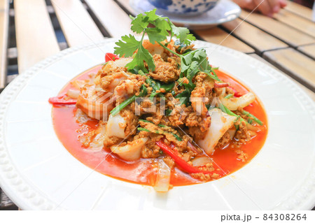 stir-fried seafood in curry powder, stir fried squid in yellow curry or Stir-fried squid and Stir-fried shrimp 84308264
