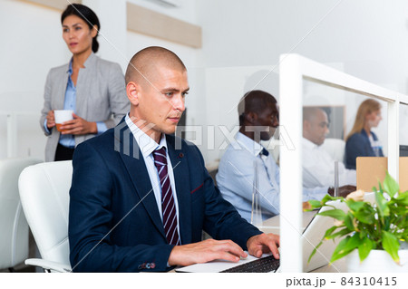 caucasian male happy businessman in white room caucasian male happy businessman in white room 84310415