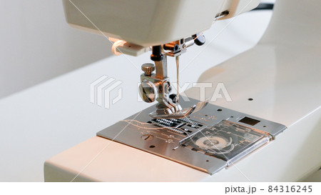 sewing machine foot and item of clothing sewing machine foot and item of clothing 84316245