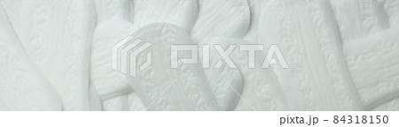 Hygiene pads on whole background, top view Hygiene pads on whole background, top view 84318150
