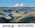 Mountain Elbrus with snowy peaks beautiful nature landscape, View at long distance. 84319402