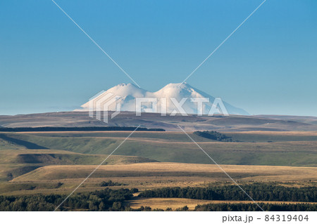 Snowy mountain Elbrus beautiful nature landscape, Long distance view. 84319404