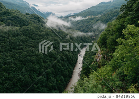 Tara River, view from the bridge, north Montenegro. Canyon of river Tara, deepest canyon in the Europe, second in the world. State of Montenegro Tara River, view from the bridge, north Montenegro. Canyon of river Tara, deepest canyon in the Europe, second in the world. State of Montenegro 84319856
