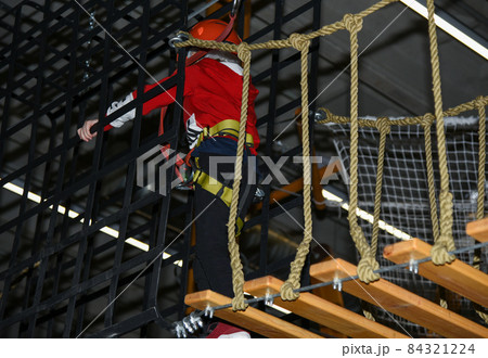 Active attraction kids move in the rope park 84321224