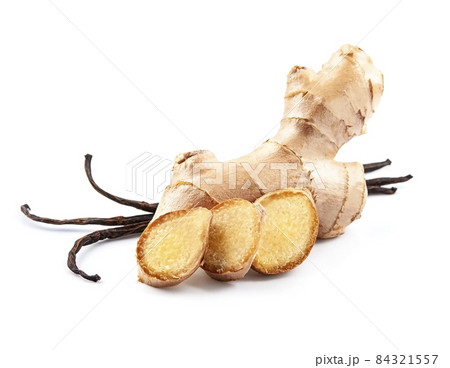 Ginger root with vanilla sticks  on white backgrounds. 84321557