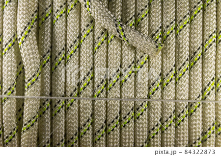 Close-up of coiled sport climbing rope Close-up of coiled sport climbing rope 84322873