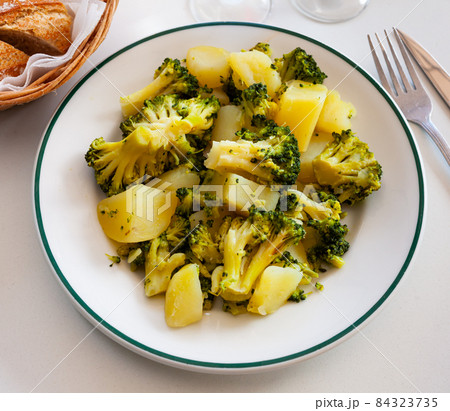 Boiled broccoli with potato, healthy lenten dinner 84323735