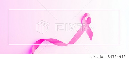 Pink ribbon background. Health care symbol pink ribbon on white background. Breast cancer woman support concept. World cancer day. Pink ribbon background. Health care symbol pink ribbon on white background. Breast cancer woman support concept. World cancer day. 84324952